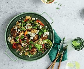 Greek-style meatballs with warm veg salad (Noni Jenkins)