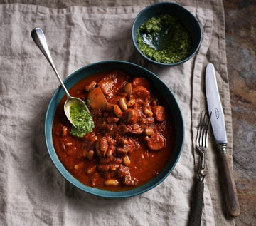 Slow cooked beans with walnut pesto