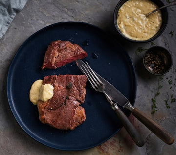 Sous-vide rare beef steak with bearnaise sauce