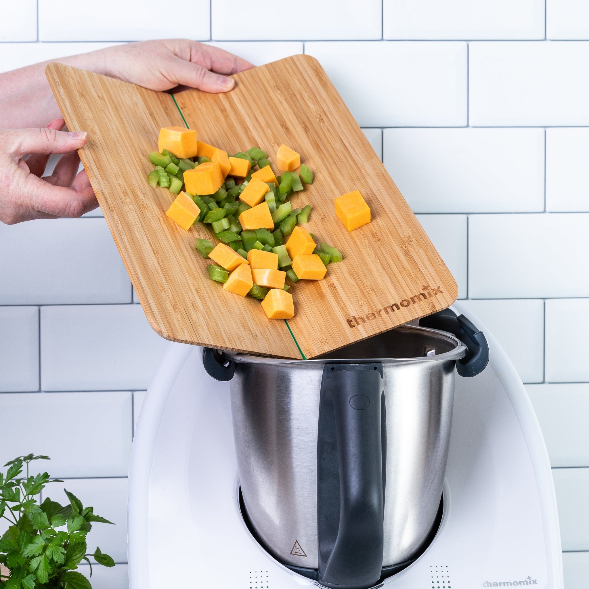 Thermomix® Bamboo Folding Chopping Board above Thermomix